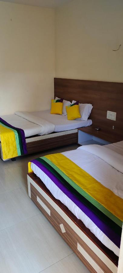 Hotel President House Mātherān Quarto foto